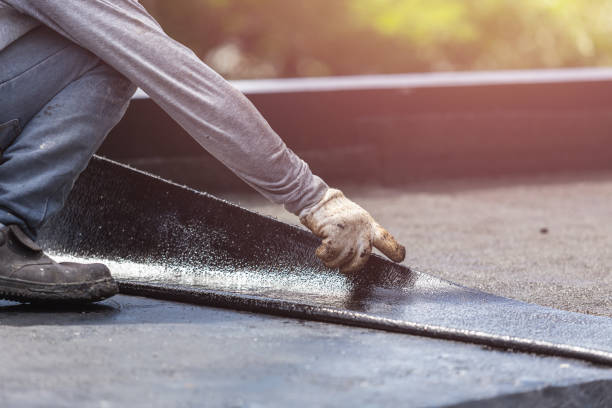 Professional Basement Waterproofing technician working in Wyoming, PA